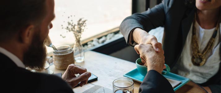 two people shaking hands