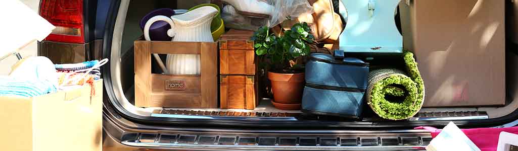 car boot packed with moving things