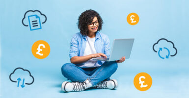 woman using laptop with pound sign and cloud storage signs