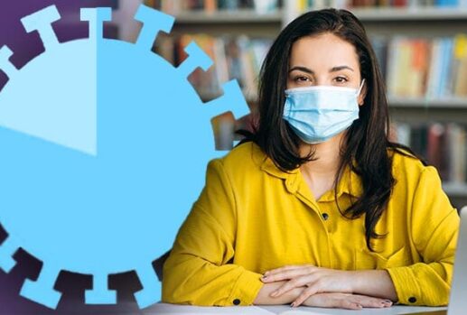 Woman at desk wearing face mask with chart in the shape of the coronavirus virus