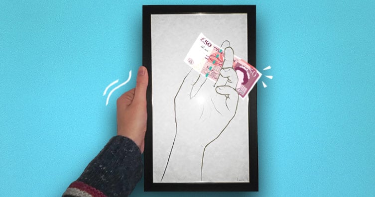 Framed drawing of a hand with a £50 note