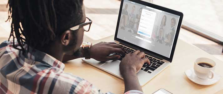 Man on LinkedIn laptop