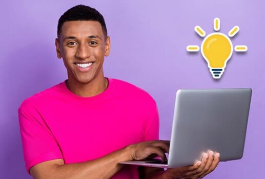 Man with laptop and lightbulb