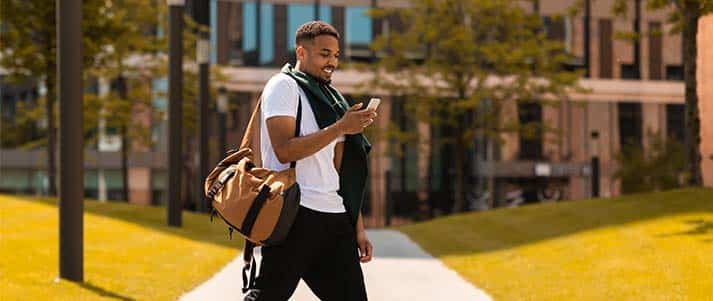 man looking at phone