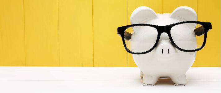 piggy bank wearing glasses