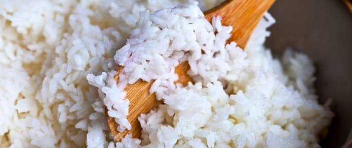 Wooden spatula with sticky rice