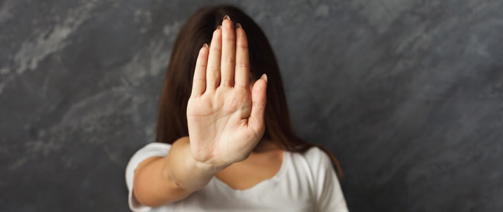 woman holding up her hand