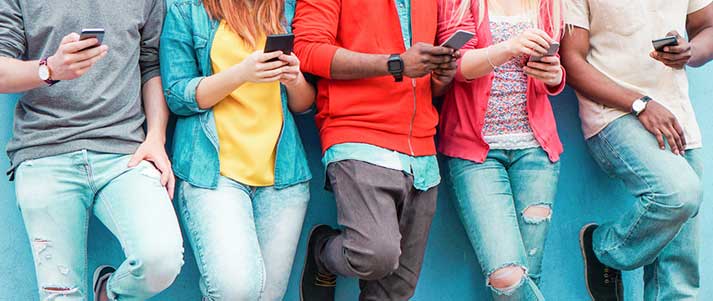 group of friends on phones