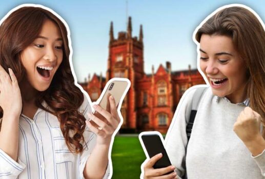 two excited happy students looking at their phones