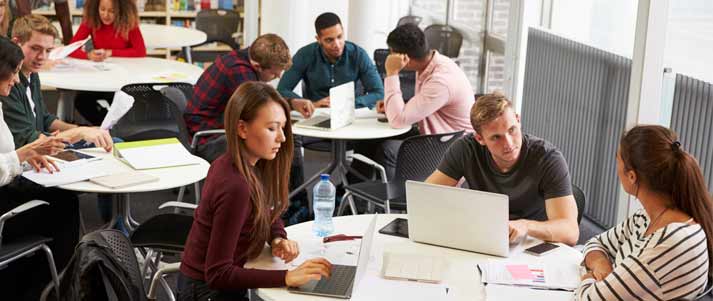 students sat around a table