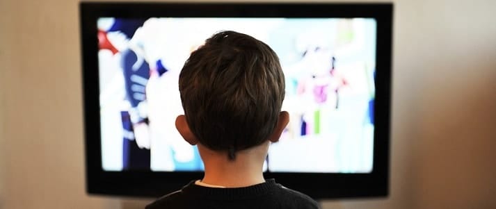 child watching television