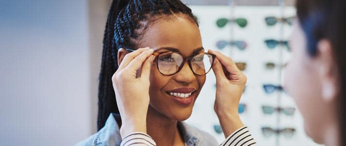 woman having glasses fitted