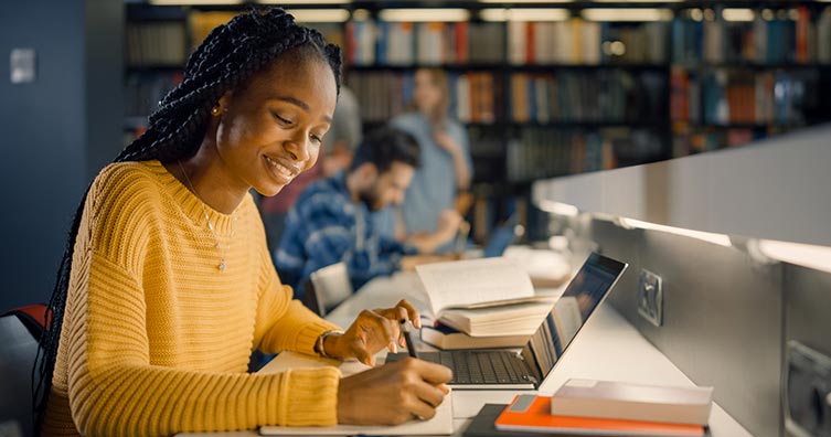 Woman studying in library