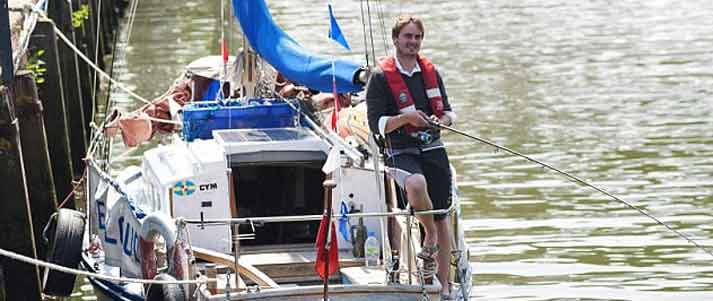 student joe pearce fishing from his yacht